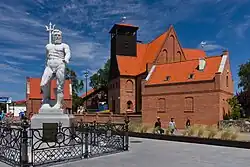 Neptune fountain and Saints Peter and Paul Church
