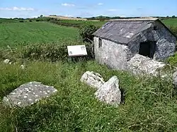 Historic site information board at Millin Bay Cairn