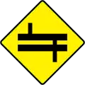 W 021L Staggered Crossroads Ahead at Dual C'way - Left