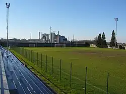 The sports field ex Sporting in via Campioli. In the background, the district heating Rete 2 plant​​‌