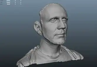 A digital rendering of a man's face in a motion capture software.