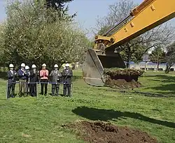 Groundbreaking ceremony with an excavator, marking the start of construction of the new Line 6 of the Santiago Metro on September 13, 2012, in which President Sebastián Piñera (fourth from left) took part