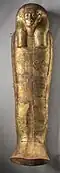 Golden coffin lid shaped like a mummy