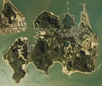 Island with forests, lakes, buildings, and quays