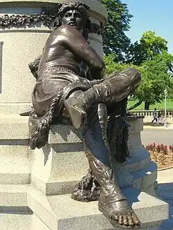 One of three sculptures on the pedestal