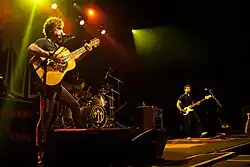The John Butler Trio (left to right: John Butler on guitar, Nicky Bomba on drums, Byron Luiters on bass) performing in Toronto c. 2012