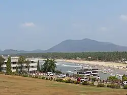Murudeshwara beach with boats and jet skis