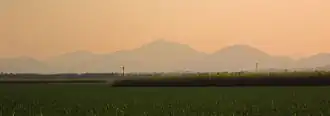 Grassland in Queensland with mountains in background