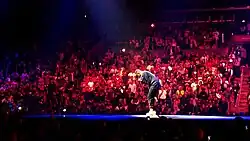 Kendrick Lamar performs in October 2013 during the Yeezus Tour