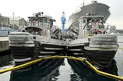 Kittanning and Opelika (YTB-798) at Yokosuka, Japan