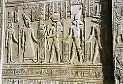 Ptolemy VIII and his wife Cleopatra II facing the gods Re-Horkhty Horus and [[Sobek]