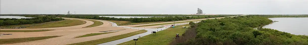 Crawlerway junction at the LC-39 observation gantry. The right track leads to pad LC-39A (pictured with Space Shuttle Endeavour), while the left track leads to pad LC-39B.