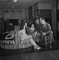 During intermission at one of the bi-weekly "open house" dances held in the main lounge of Idaho Hall, Arlington Farms.[10]