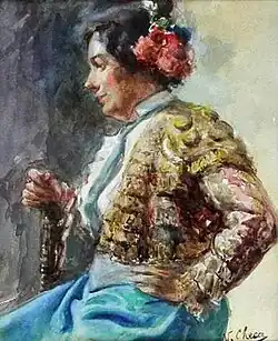 An oil painting depicting a woman in bullfighting clothing sitting on a chair. She is turned to the viewer's left and she has flowers in her hair.