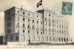 A stamped postcard with a hotel