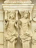 Female caryatids on the facade of palazzo Marrese