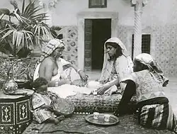 Tea on the patio, photograph by Rudolf Lehnert, 1910.