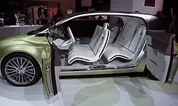 A Lincoln concept car (Lincoln C) from 2009 with rear suicide doors, left side doors open. Note that there is no B-pillar and therefore there are two pillars, A and C.