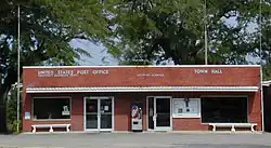 The Lockhart post office and town hall share a building at the east end of oak-canopied Seminole Street.
