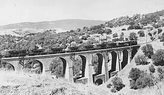 A CFAE 6AE locomotive hauling an ore train on the Souk-Ahras to Oued Keberit line.