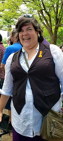 Woman smiling at an outdoor event