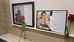 Memorial with roses and poems by James Baldwin and June Jordan, May 24, 2025.