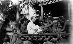 Picture of Bronislaw Malinowski with natives on Trobriand Islands.