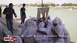 A drabsha being carried to the Tigris River