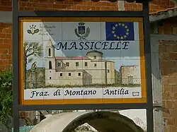 A ceramic plaque representing the village church