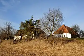 Group of houses in Underfar (Meienried), view from the old course of the Zihl river
