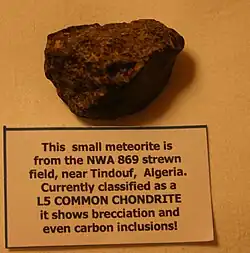 Meteorite with brecciation and carbon inclusions from Tindouf, Algeria[26]