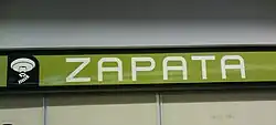 The station logo, depicting an eyeless, stylised Zapata.