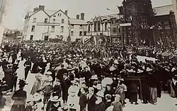 The town square of Millom, filled with around 200 people. This photo was taken at the peak of Millom's significance, when it was a flourishing mining town.