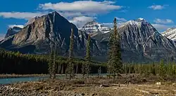 Mount Fryatt centered behind its outliers as seen from the Icefields Parkway