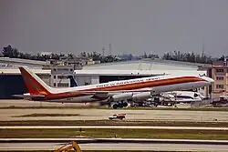 An American Intl' Airways Douglas DC-8-62CF landing at Miami.