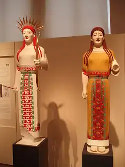 Alternative reconstructions of the Peplos Kore displayed at the Athens show