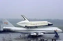 Space Shuttle Enterprise attached to Shuttle Carrier Aircraft for ferry flight