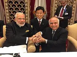Ryuko Hira with Prime Minister of India, Narendra Modi and Minister of Economy, Trade, and Industry of Japan - Yasutoshi Nishimura