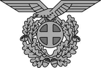 Emblem of Statspolitiet contained Nasjonal Samling's sun cross with eagle.