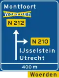 K9: Diversion with alternative route shown on an advance warning panel for a non-motorway highway