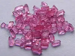 Small translucent, pink-coloured crystals a bit like the colour of candy floss