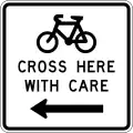 Cyclists Cross Here With Care (to the left)