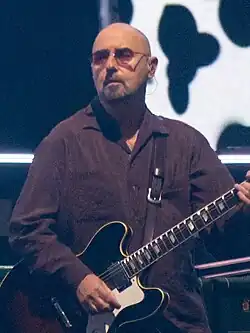 Arthurs performing with Oasis in July 2025