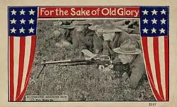 Old Glory postcard with U.S. soldiers firing an M1909 machine gun