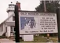Sign adjacent to the lighthouse