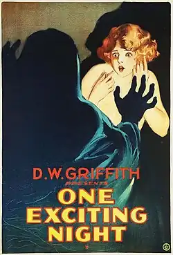 Poster of a shadowy figure confronting a woman