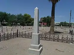 Grave site of Florence Esther Walker, wife of J. Ernest Walker, who died June 13, 1909. Her grave is located in the "Porter Cemetery" section of the cemetery.