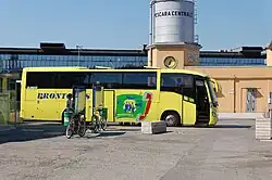 A long yellow bus
