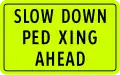 Slow down, pedestrian crossing ahead (plate type)