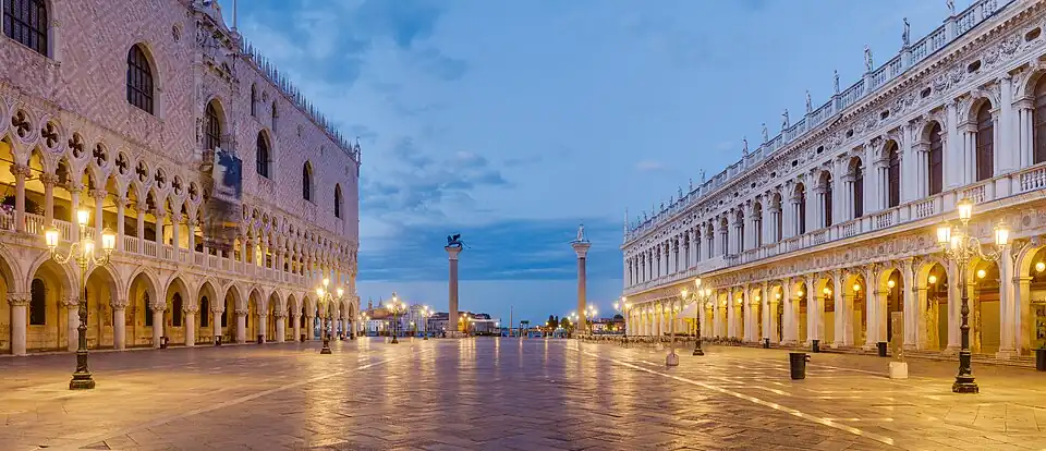 Image 4View of Piazzetta San Marco toward Grand Canal of Venice, at dawn, with Doges' Palace on the left and Biblioteca Marciana on the right.